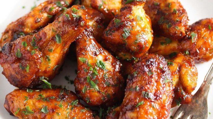 air fryer frozen chicken wings cooked and on a plate