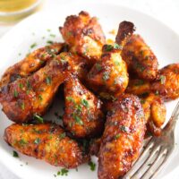spicy and crispy chicken wings on a plate