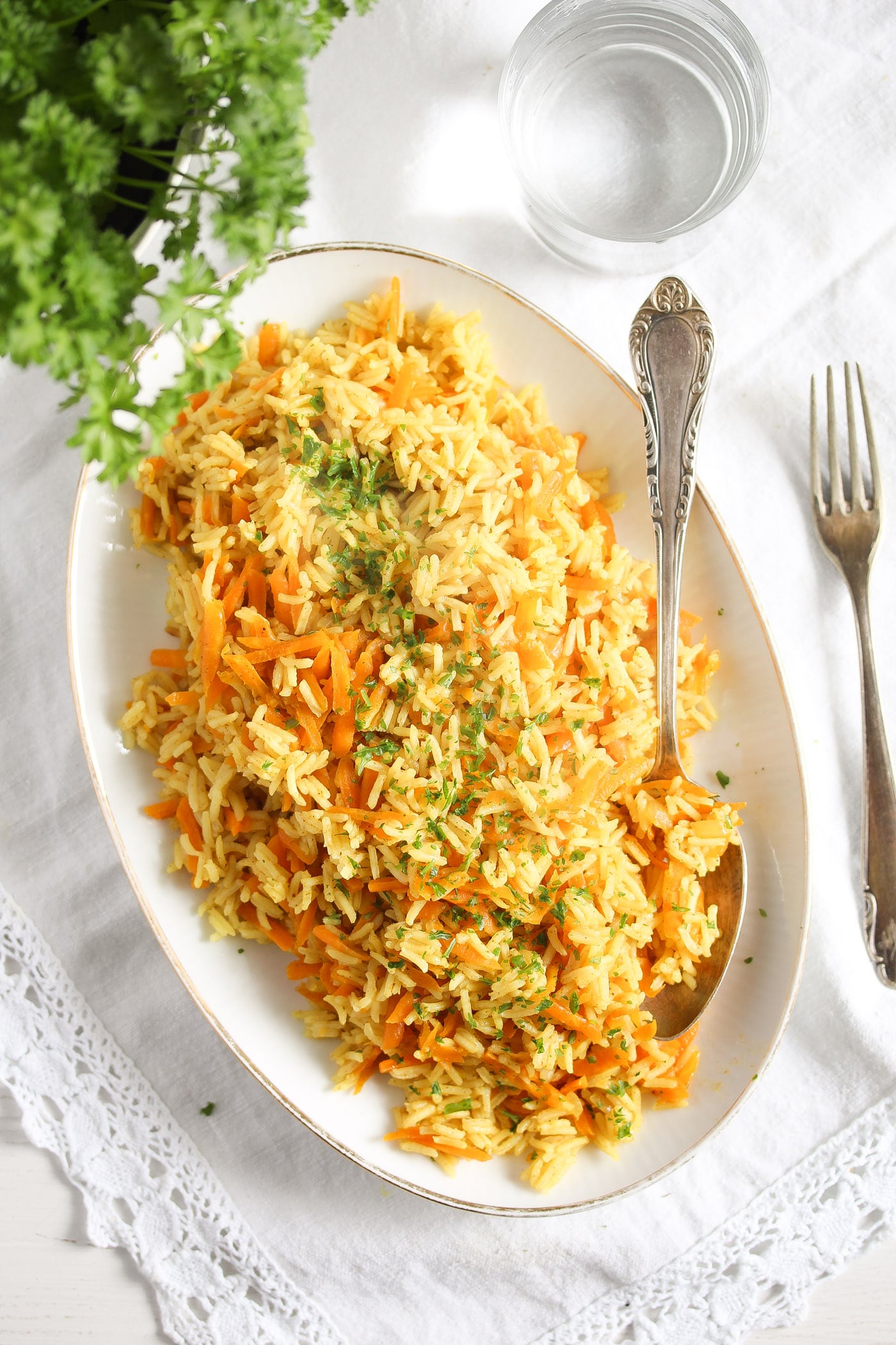 fluffy rice curry side dish served with parsley