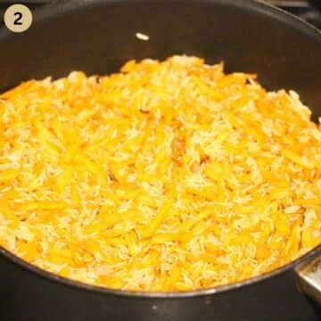 toasting long grain rice and grated carrots in a saucepan.