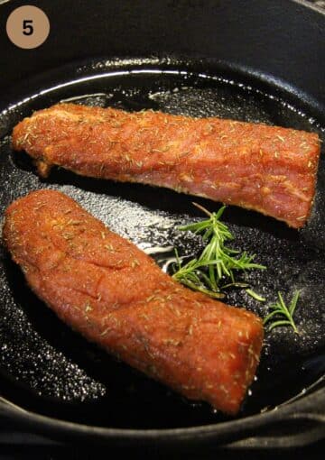 searing pork fillets with rosemary in a large skillet.