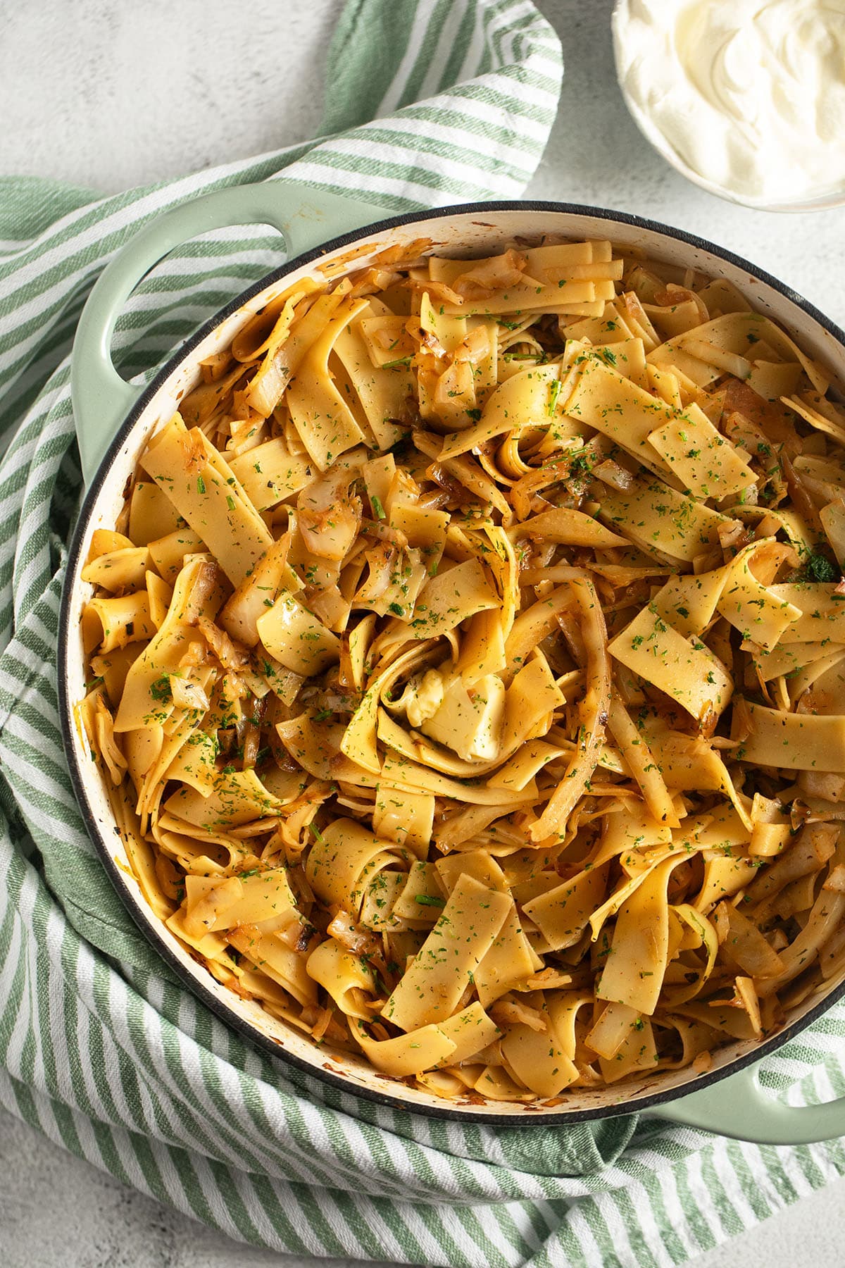 hungarian haluski made with cabbage and noodles in a large pot.