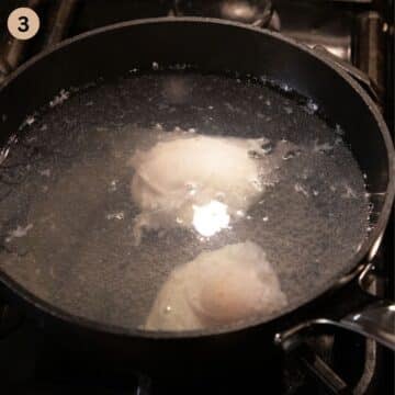 poaching two eggs in a pot of water with vinegar.