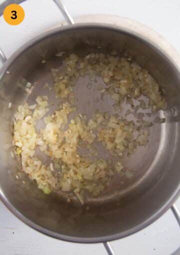 sauteing finely chopped onions in a pot to make soup.