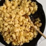 pinterest image with title romanian mac and cheese.