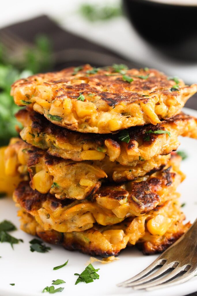 fritters with zucchini and corn stapled on plate