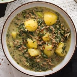 ground beef and potato curry in a bowl.