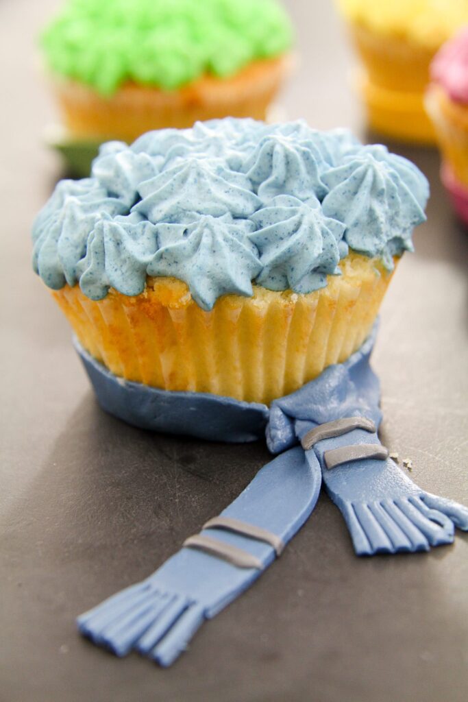 ravenclaw muffin topped with blue whipped cream