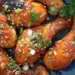 honey soy chicken drumsticks sprinkled with sesame seeds.