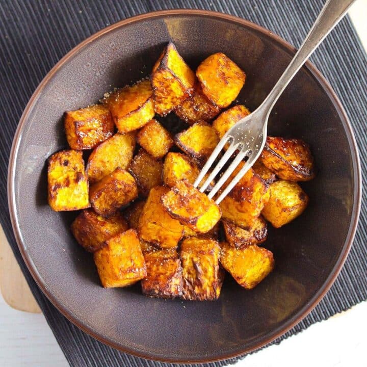 air fryer butternut squash served in a brown bowl