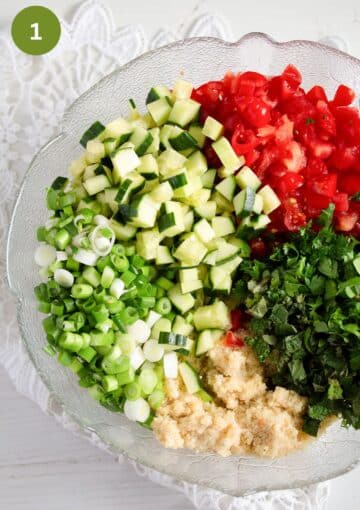 chopped vegetables and bulgur in a bowl for making tabouli.