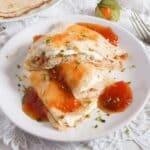 polish crepes nalesniki filled with sweet cheese and topped with apricot jam.