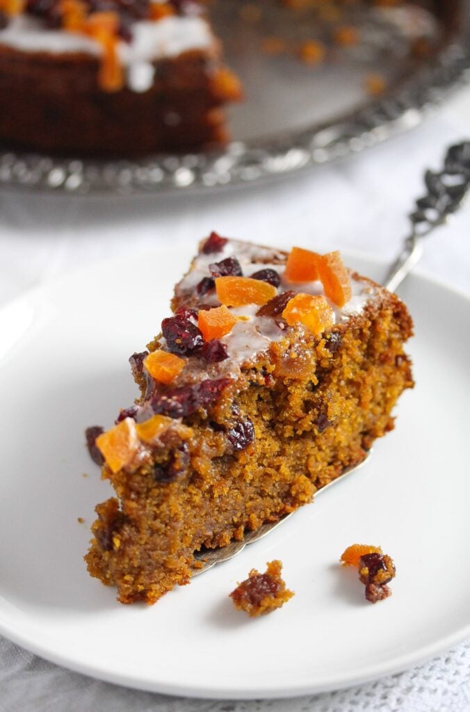 slice of pumpkin fruitcake on a small white plate