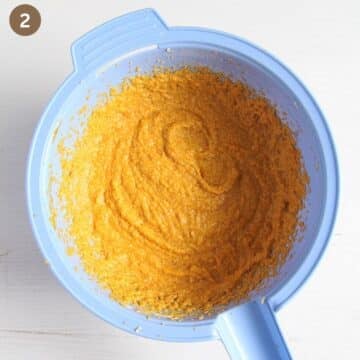 orange-colored cake batter for fruitacake with pumpkin.