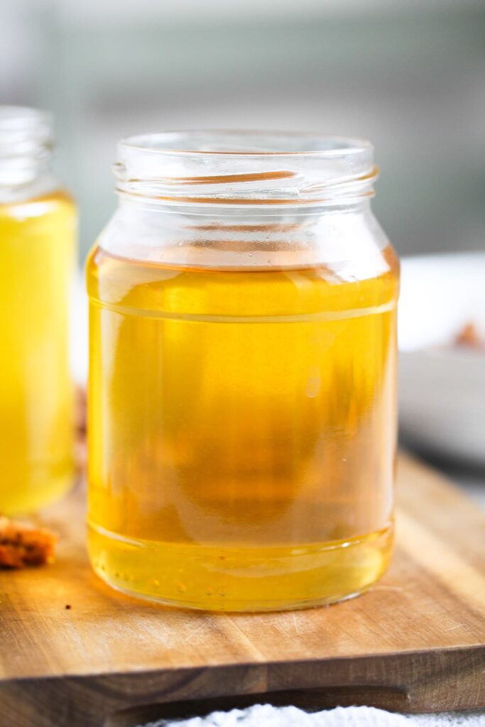 jar full of golden freshly rendered fat