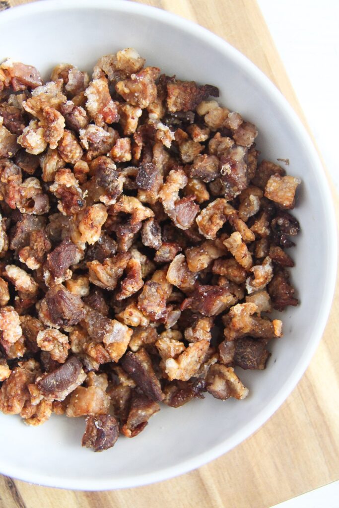 overhead image of turkey cracklings in a small bowl