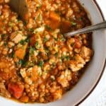 bowl with thick soup with lentils and meat