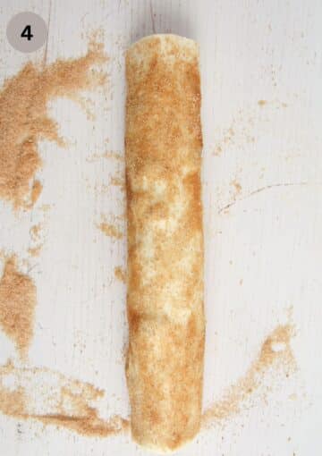 rolled puff pastry dough covered in cinnamon sugar.