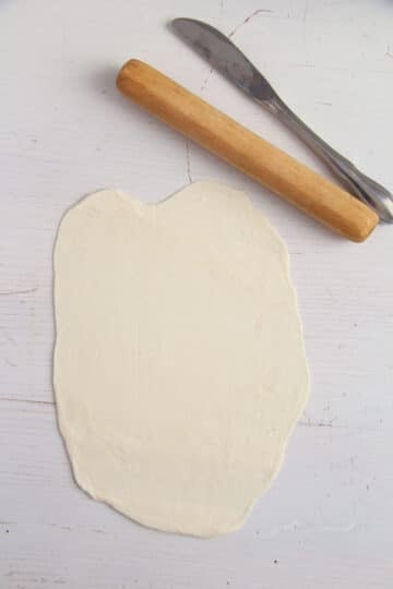 rolled puff pastry, one small rolling pin and a knife.