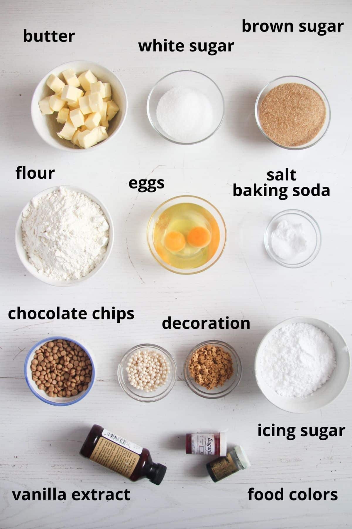 all ingredients needed for cookie cake arranged on a white table.