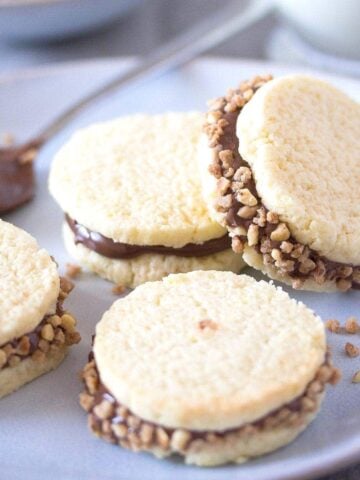 argentinian alfajores on a white plate.