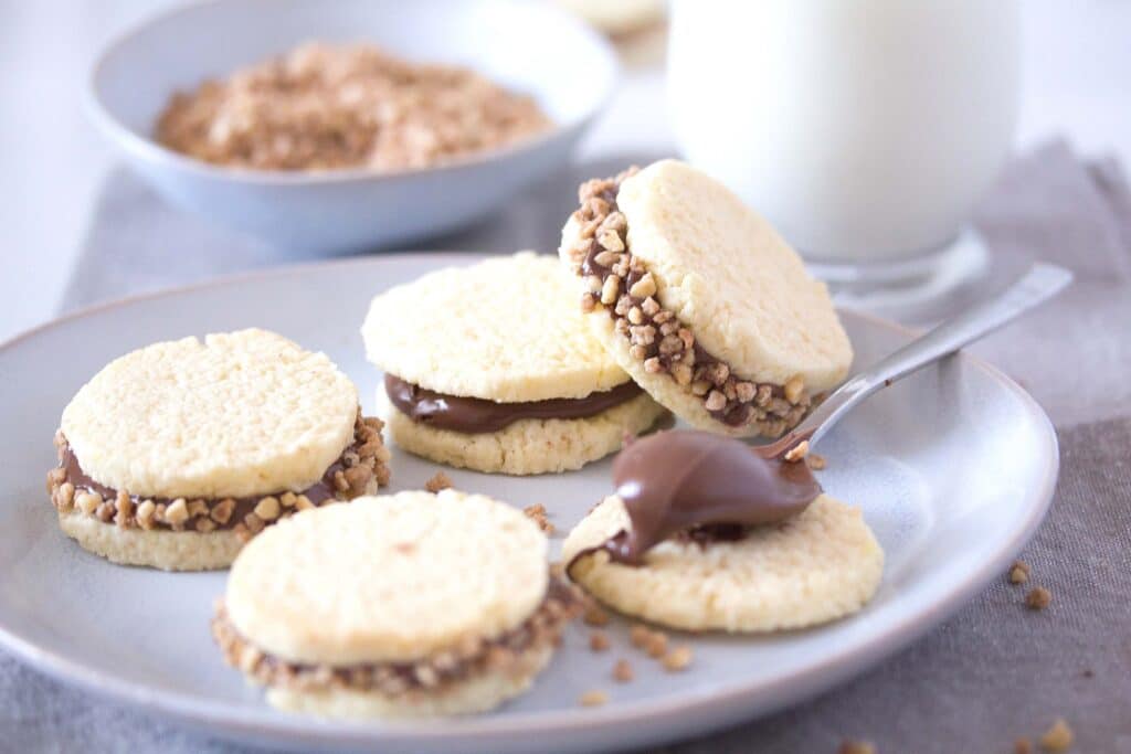 alfajores cookies filled with nutella or dulce de leche