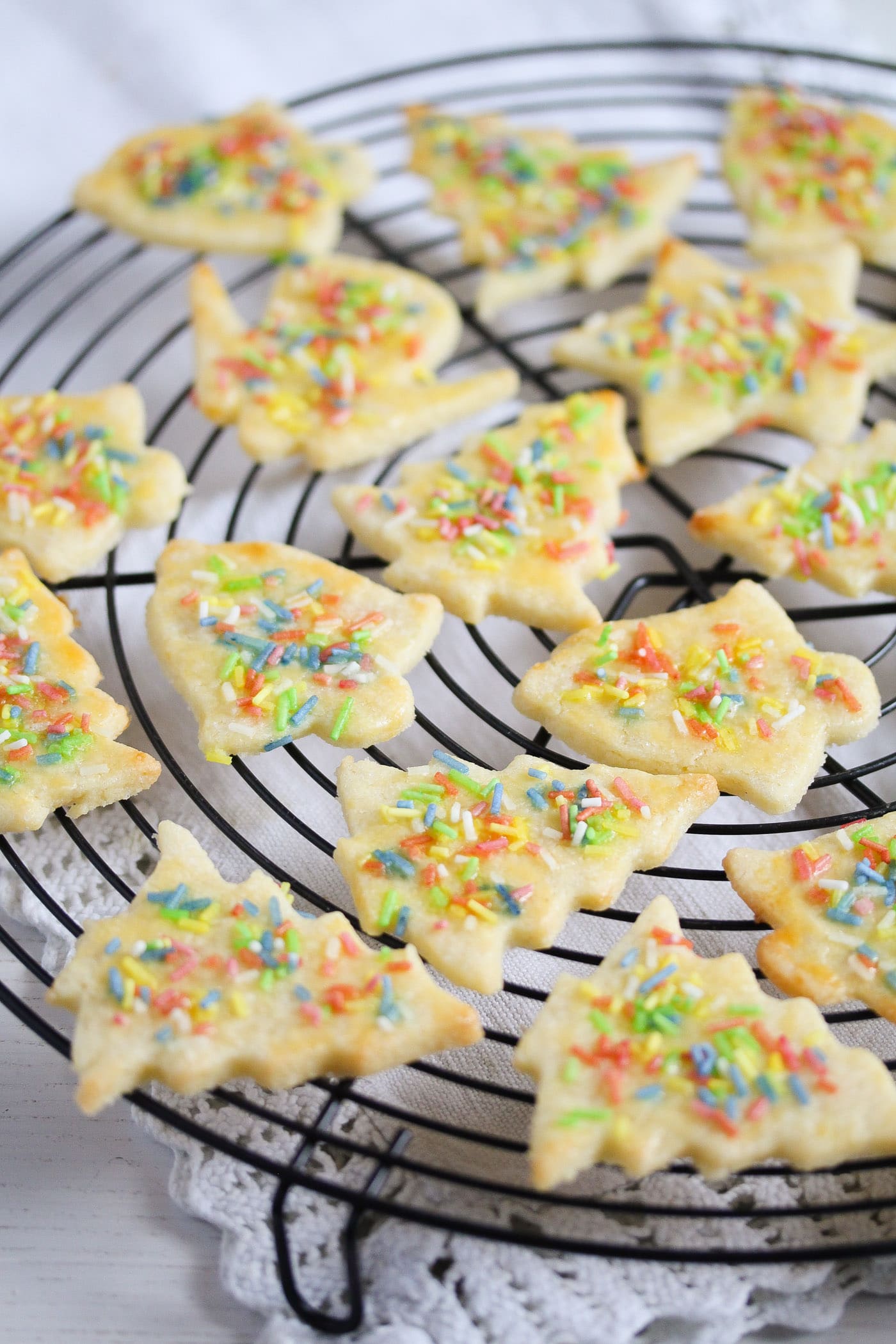 many german butter cookies on a wire rack