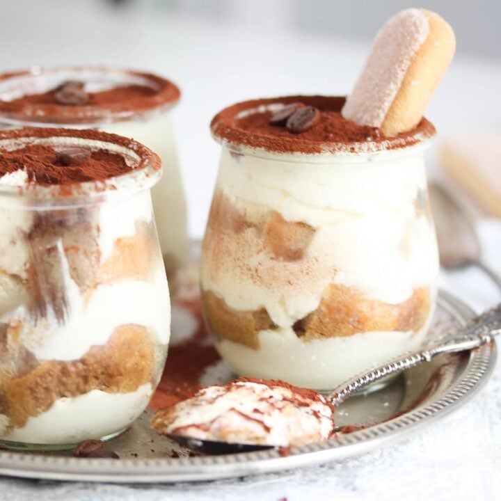 three smalls jars with mascaropone tiramisu