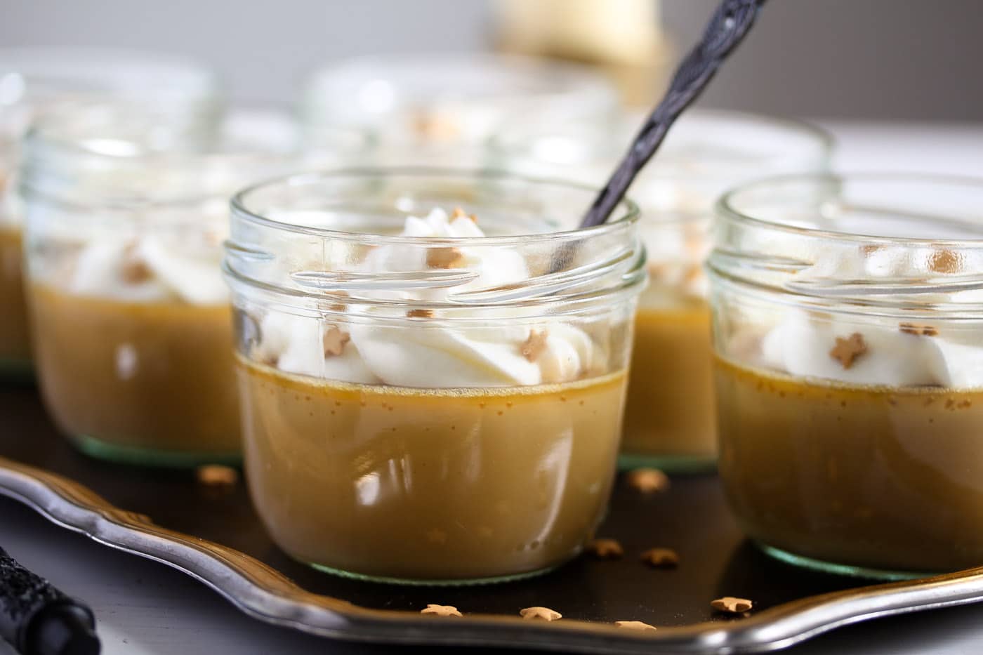 butterscotch potted cream with whipped cream on top
