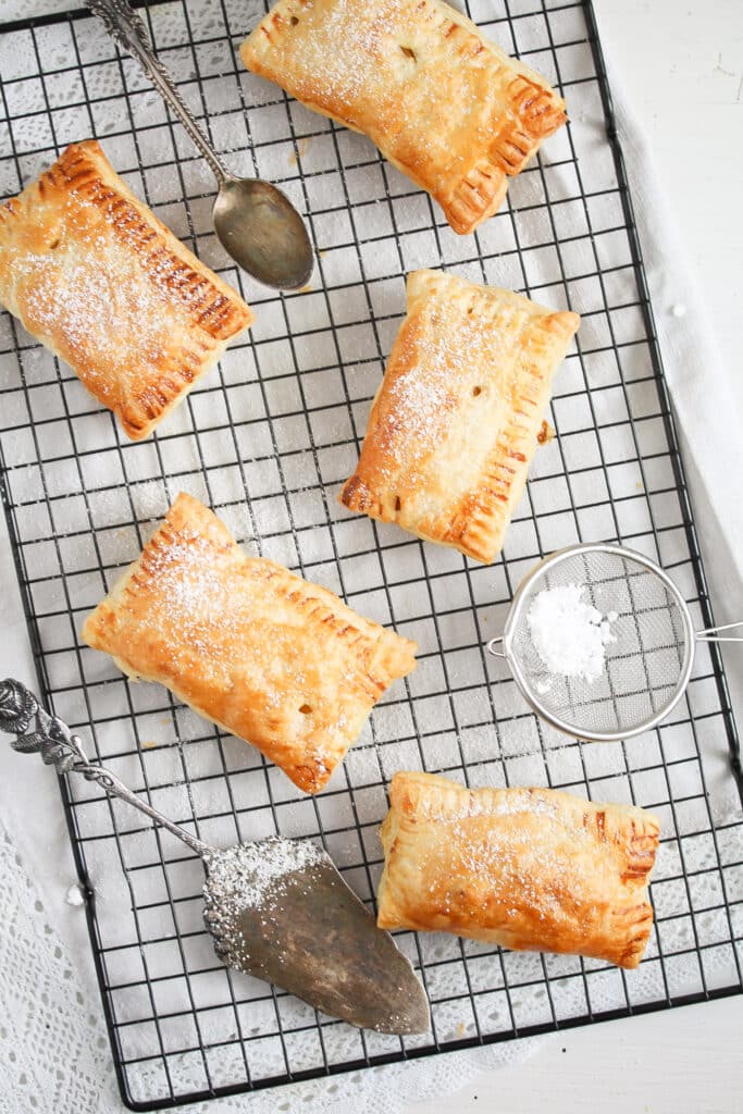 apple puff pastry squares cooling on a wire rack