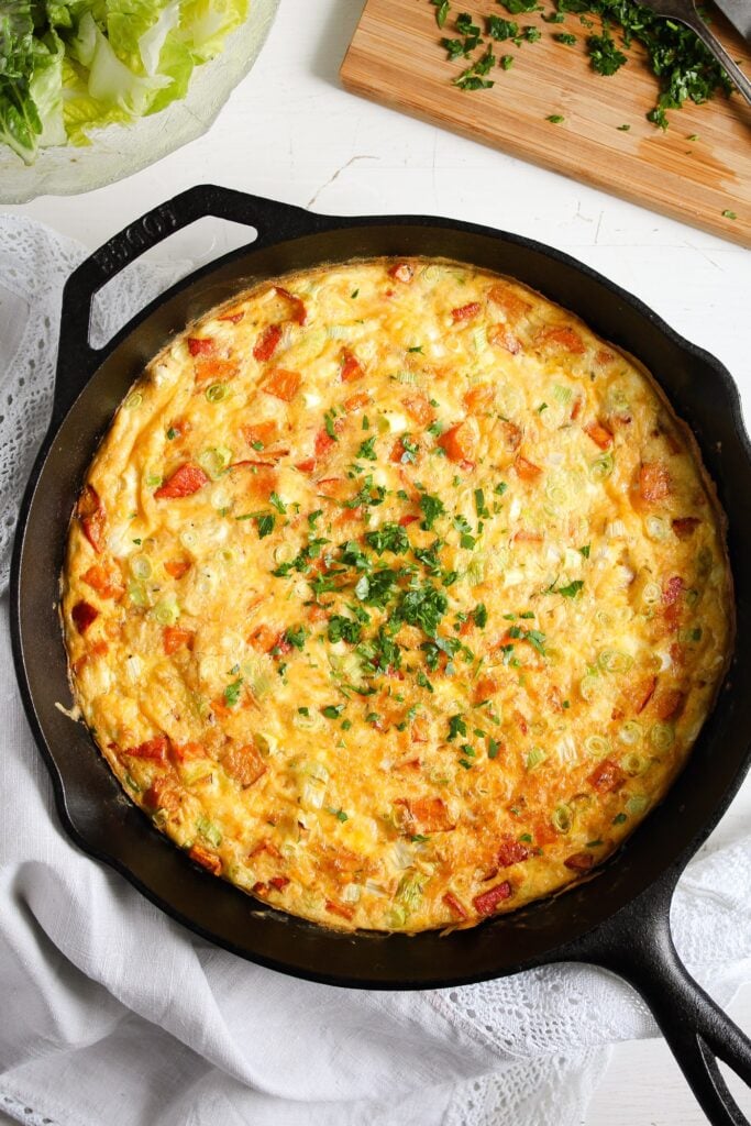 overhead shot of frittata in a cast iron skillet