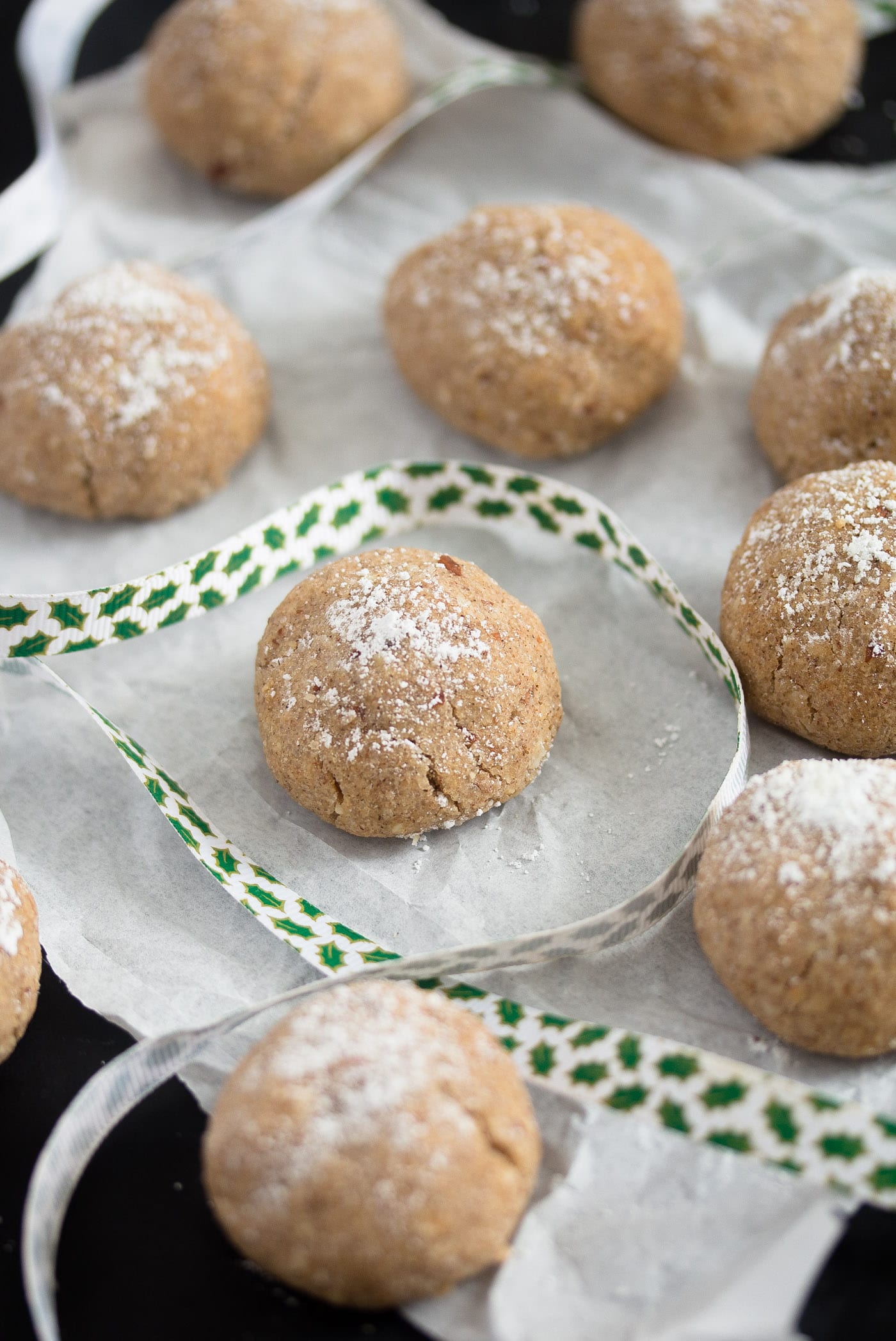 spanish christmas cookies with almonds and cinnamon on baking paper