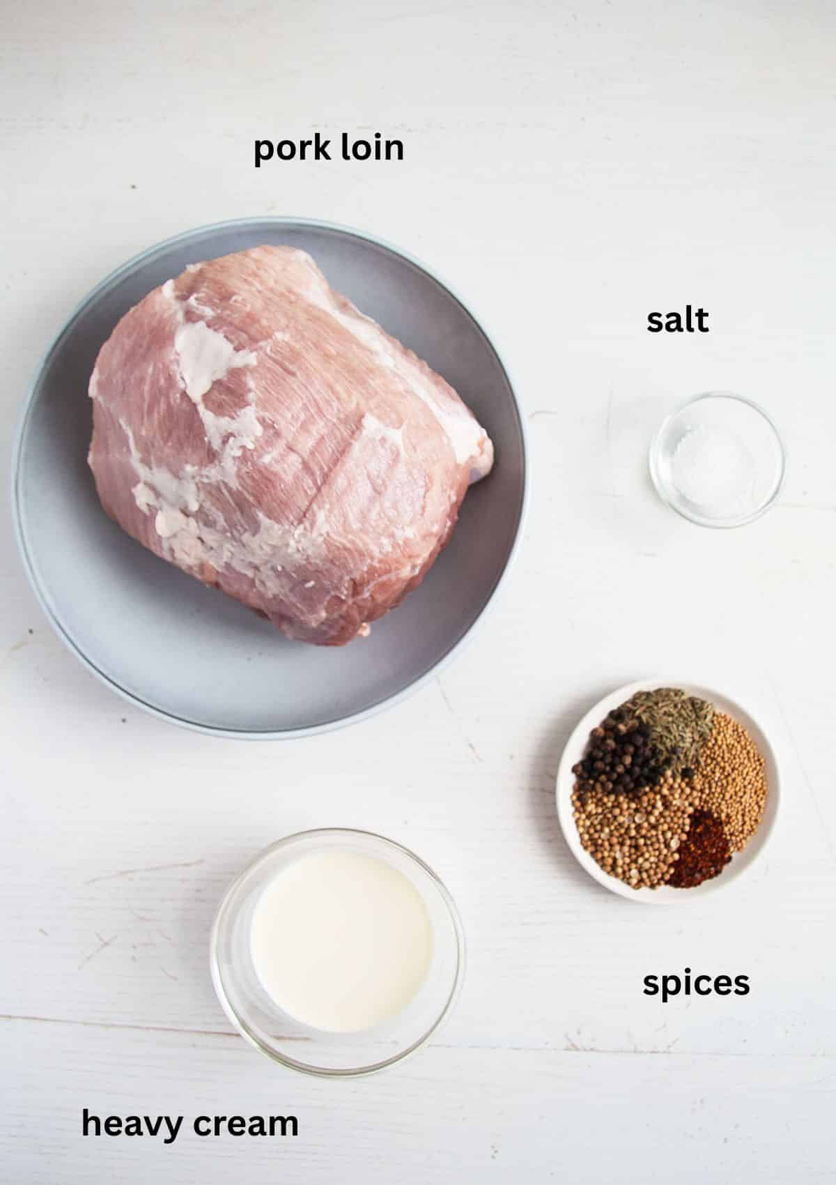 labeled ingredients for making pork loin roast with lots of spices.