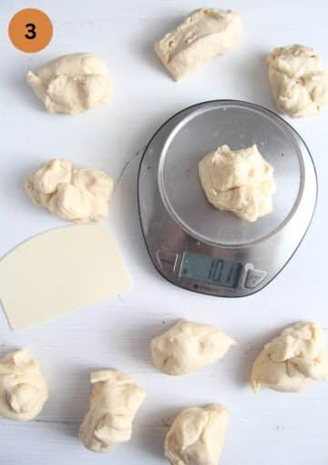 weighing pieces of yeast dough on a small kitchen scale.