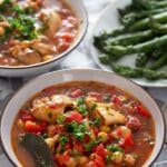 pinterest image with the title chicken chickpea stew.