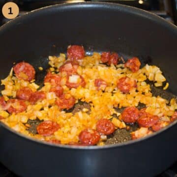 sauteing chopped onions and chorizo pieces in a large pot.