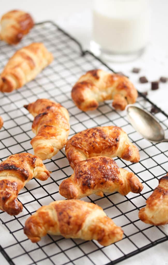 chocolate puff pastry croissants and a glass of milk