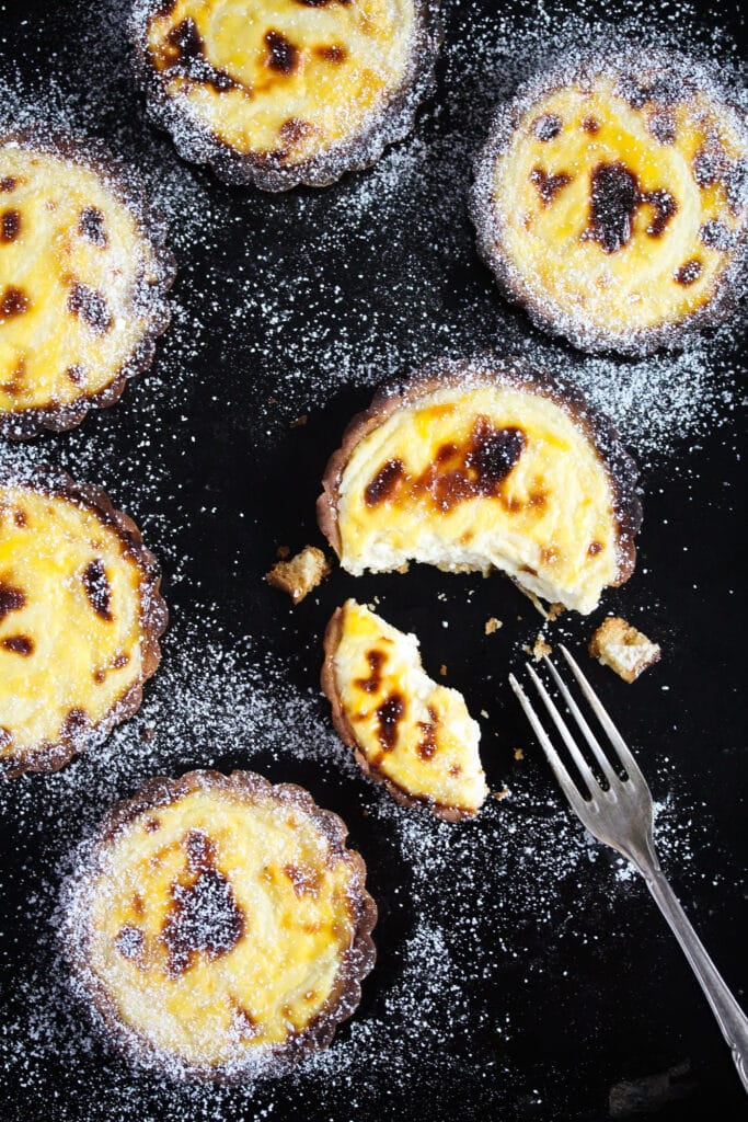 overhead shot of japanese tarts sprinkled with icing sugar
