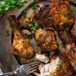 pinterest image with the title nando's chicken thighs.