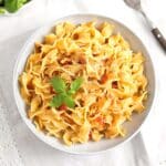 pasta in coconut milk in a large bowl.