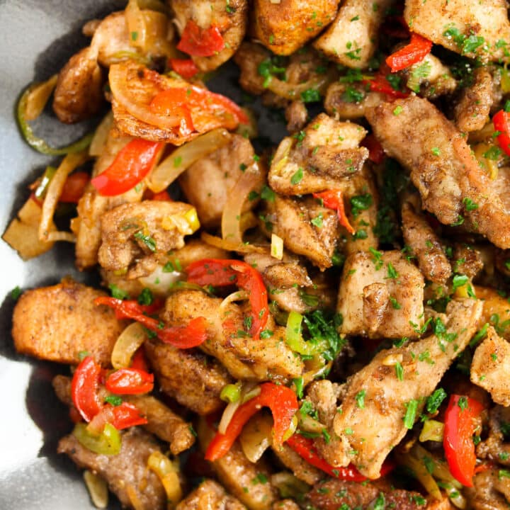 fried salt and pepper chicken on a plate close up