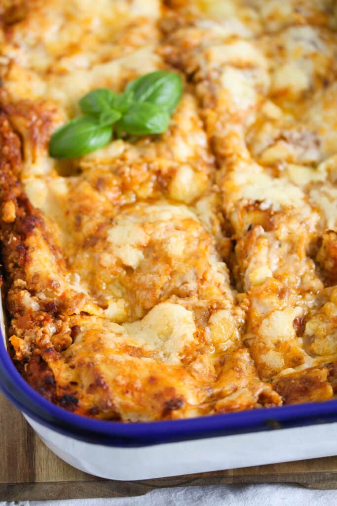 close up lasagne made in thermomix decorated with basil