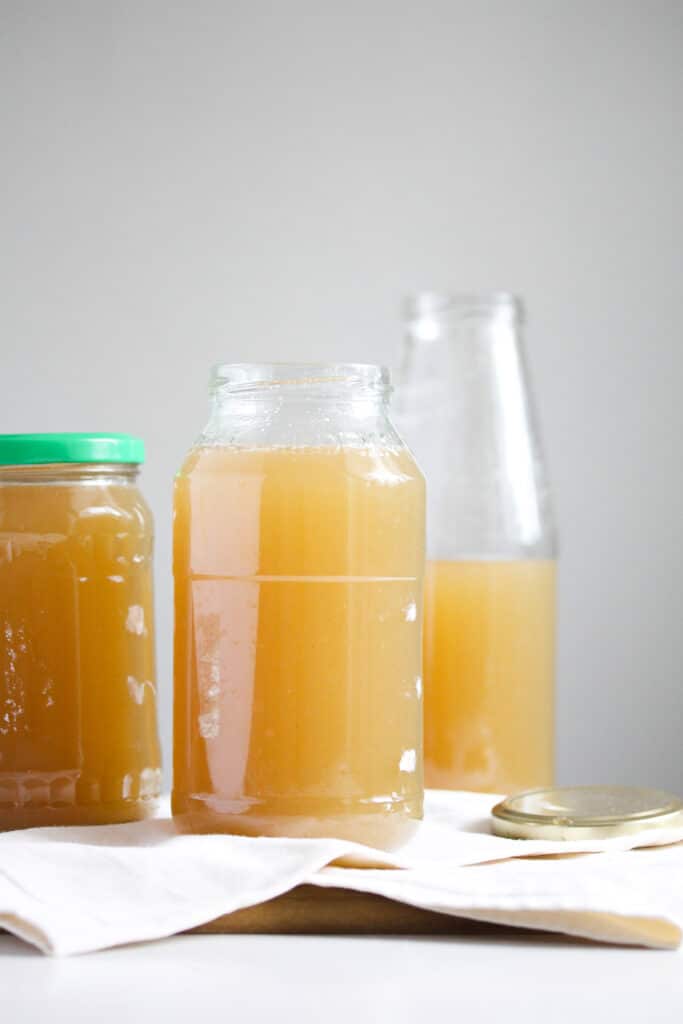 bone broth filled in jars and bottles