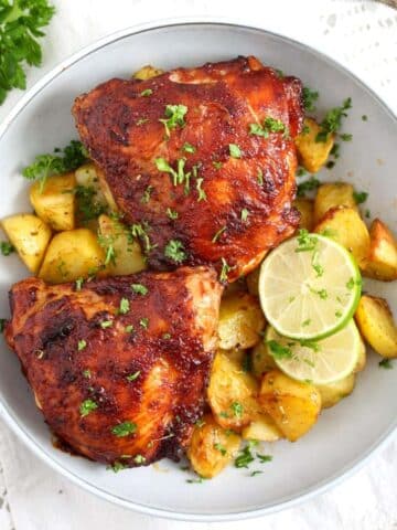 air fryer bbq chicken served with potatoes and limes