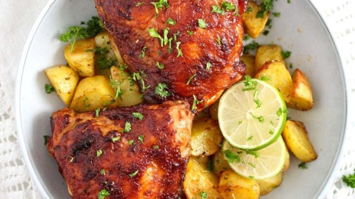 air fryer bbq chicken served with potatoes and limes