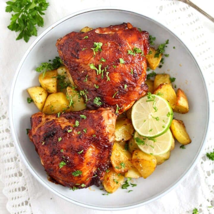 air fryer bbq chicken served with potatoes and limes