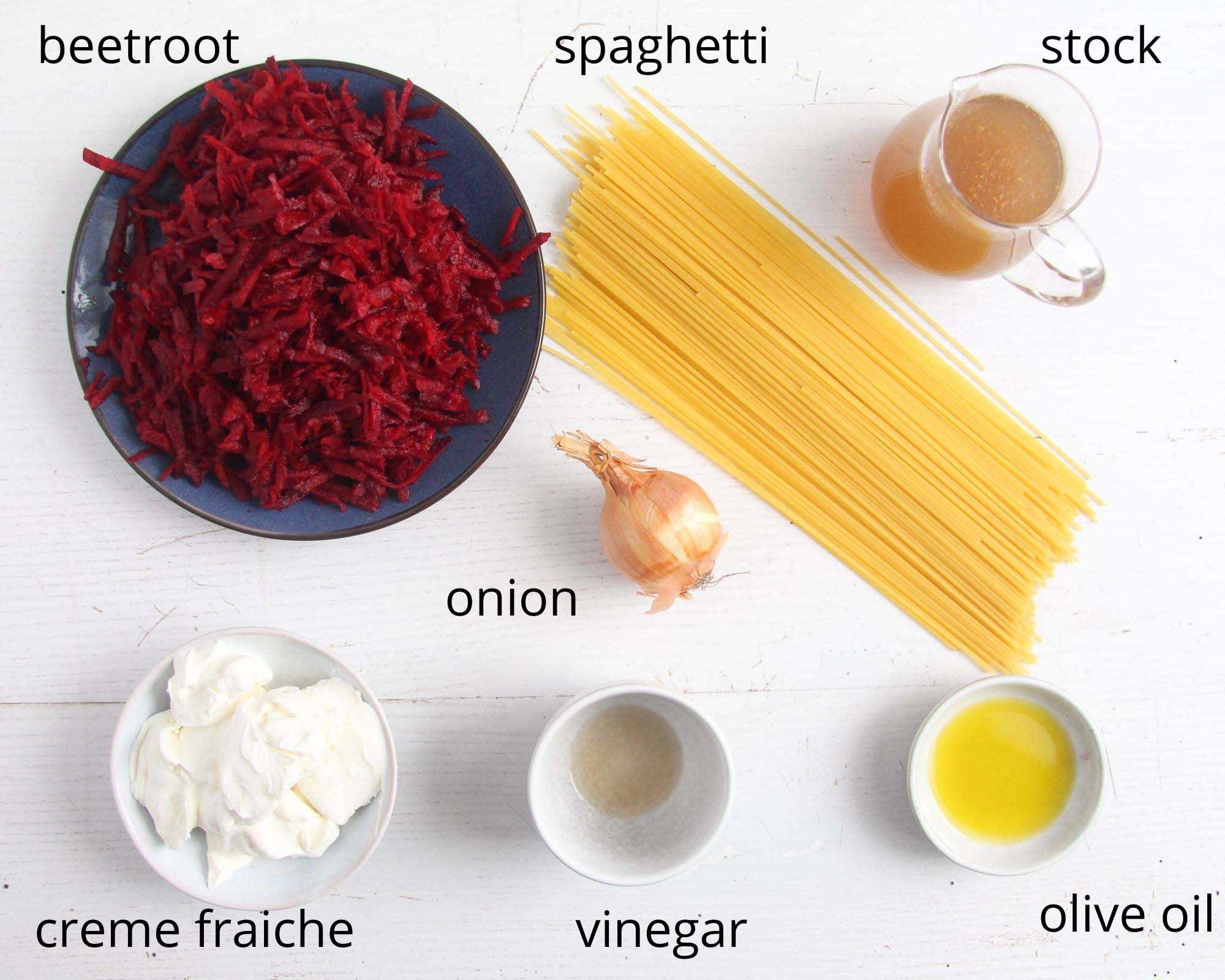 grated beets, spaghetti, onion, stock, creme fraice, vinegar and oil for making sauce