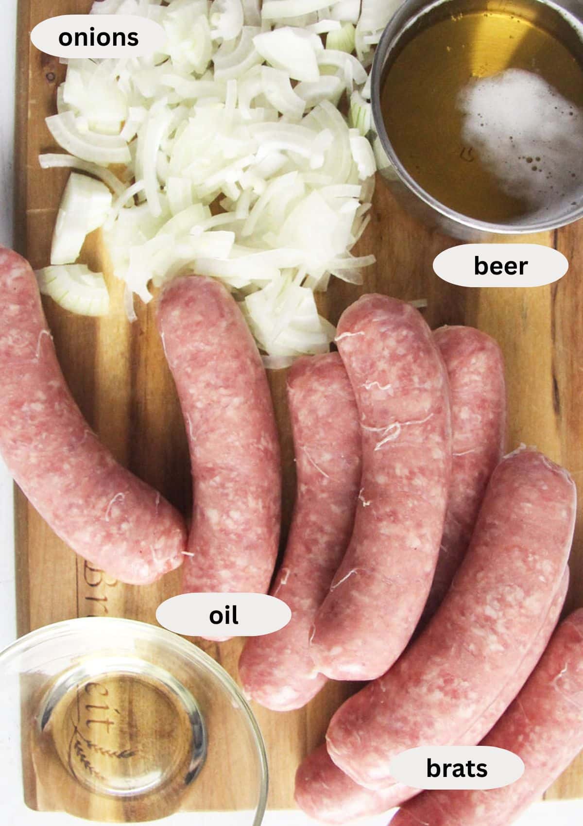labeled ingredients for making bratwurst cooked with beer, oil, and onions.
