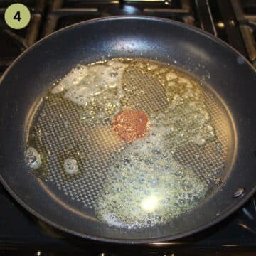 butter melted in a frying pan.