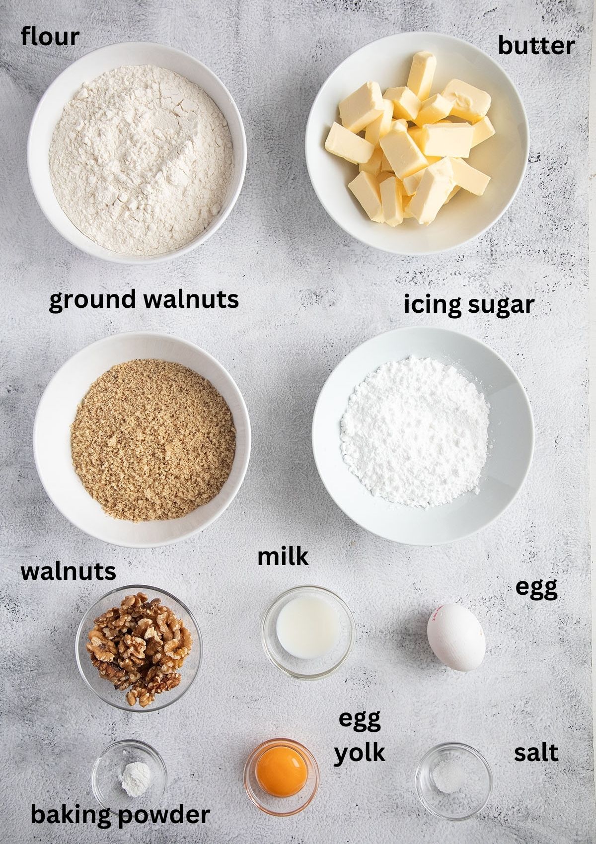 labeled ingredients for making chinese cookies with walnuts.